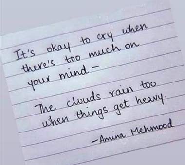 A handwritten note of comfort that reads it's okay to cry when there's too much on your mind