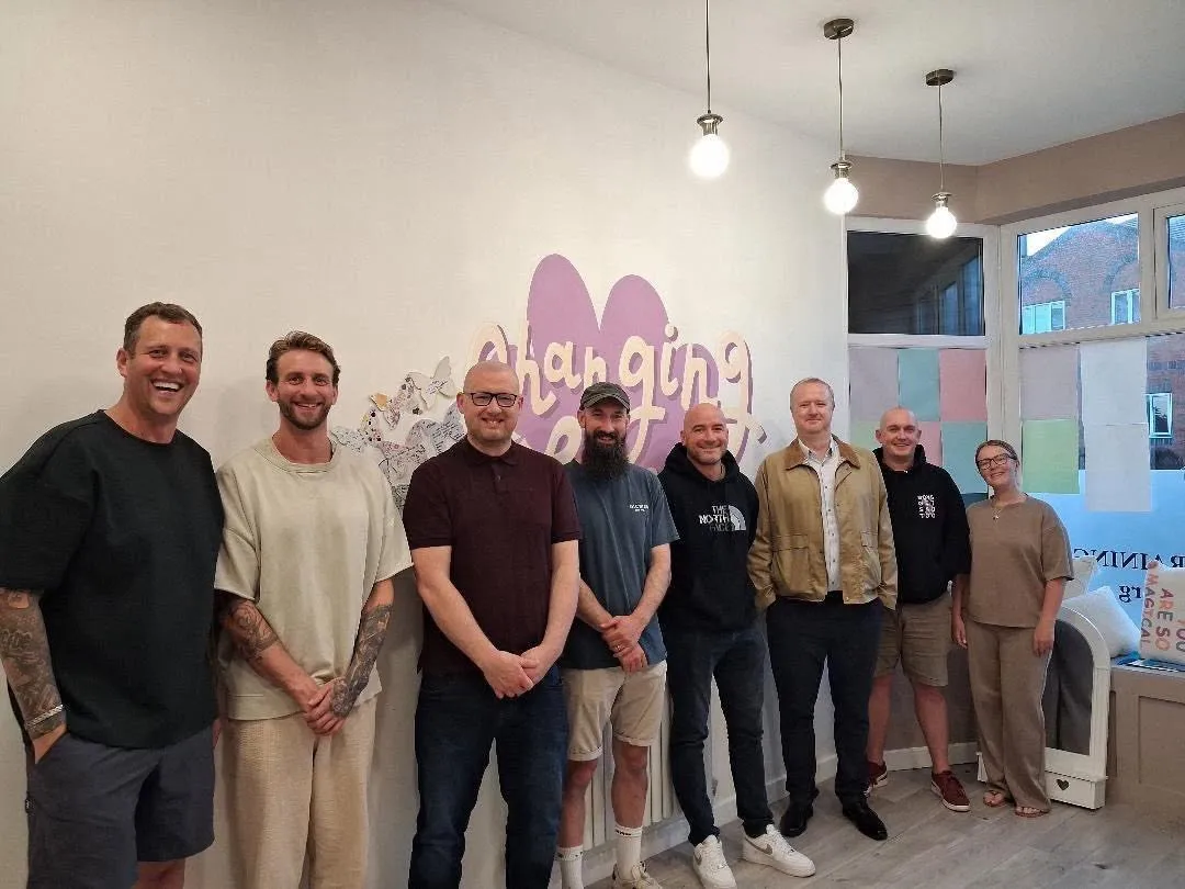 Men gathering at a Men's Night session